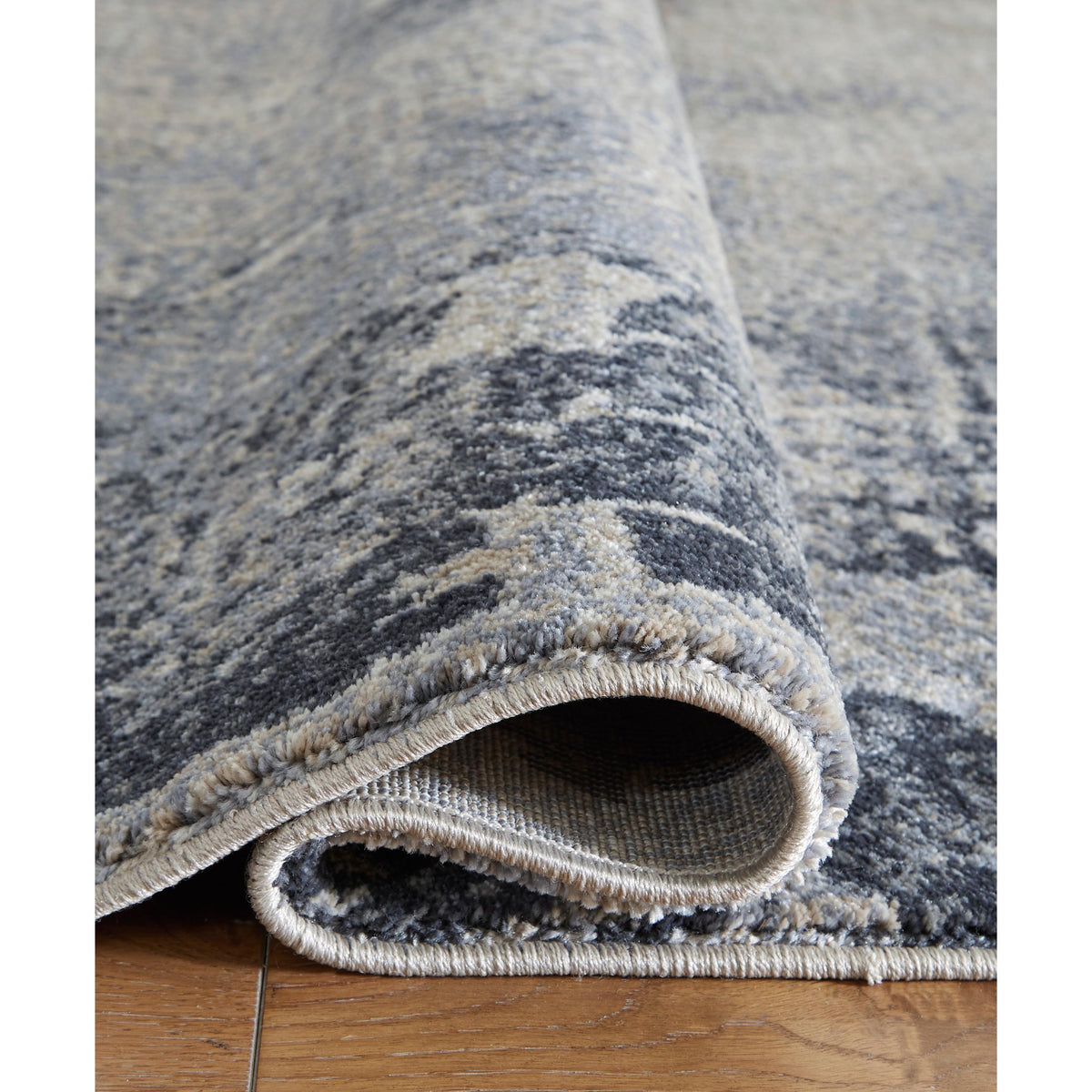Signature Design by Ashley Langrich R406132 Medium Rug