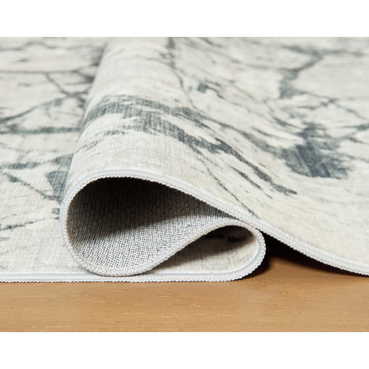 Signature Design by Ashley Tobinbury R407421 Washable Large Rug